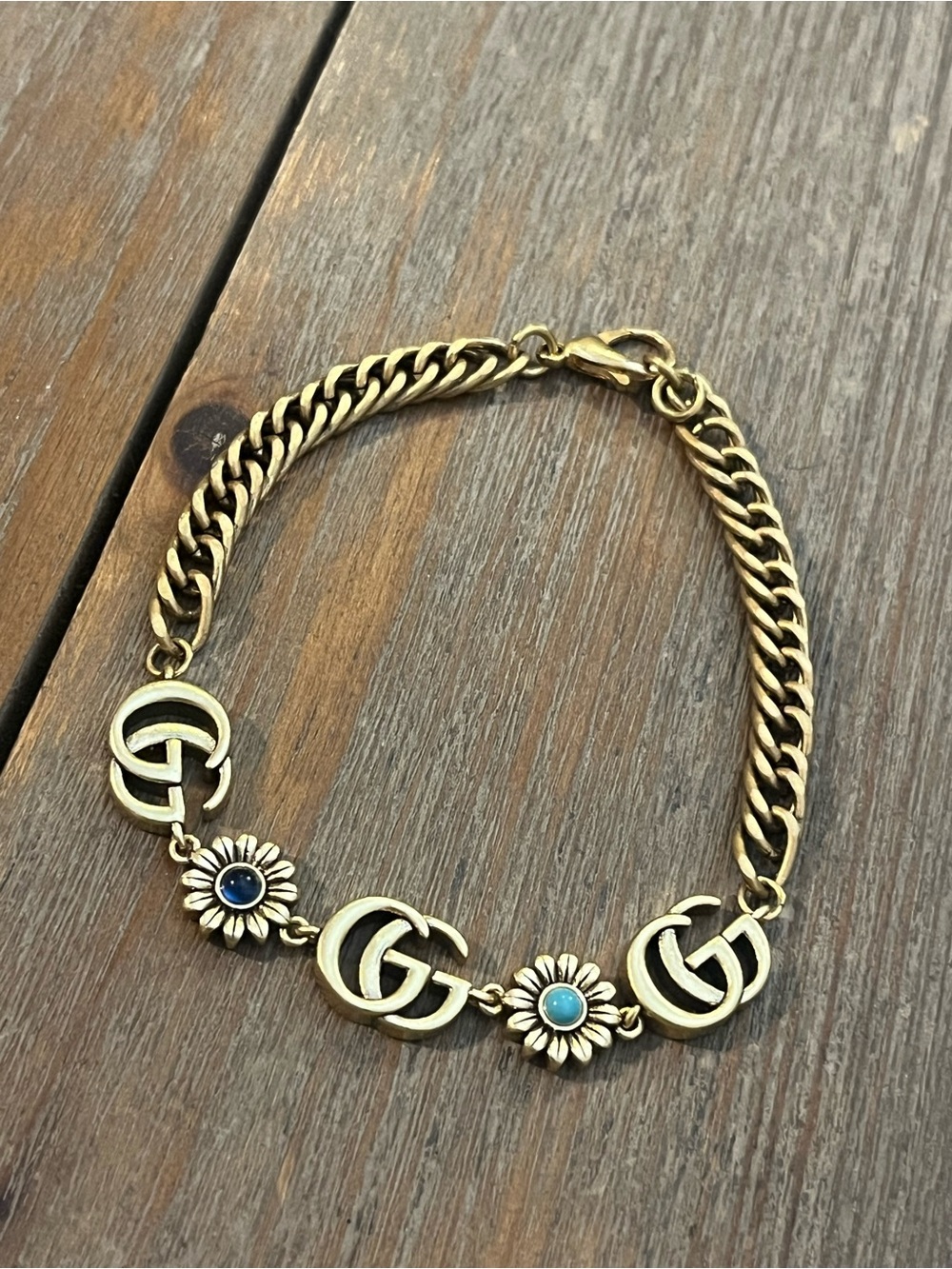 Gold-Tone Floral Chain Bracelet with Blue Accent